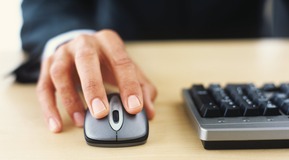 A man using a computer mouse